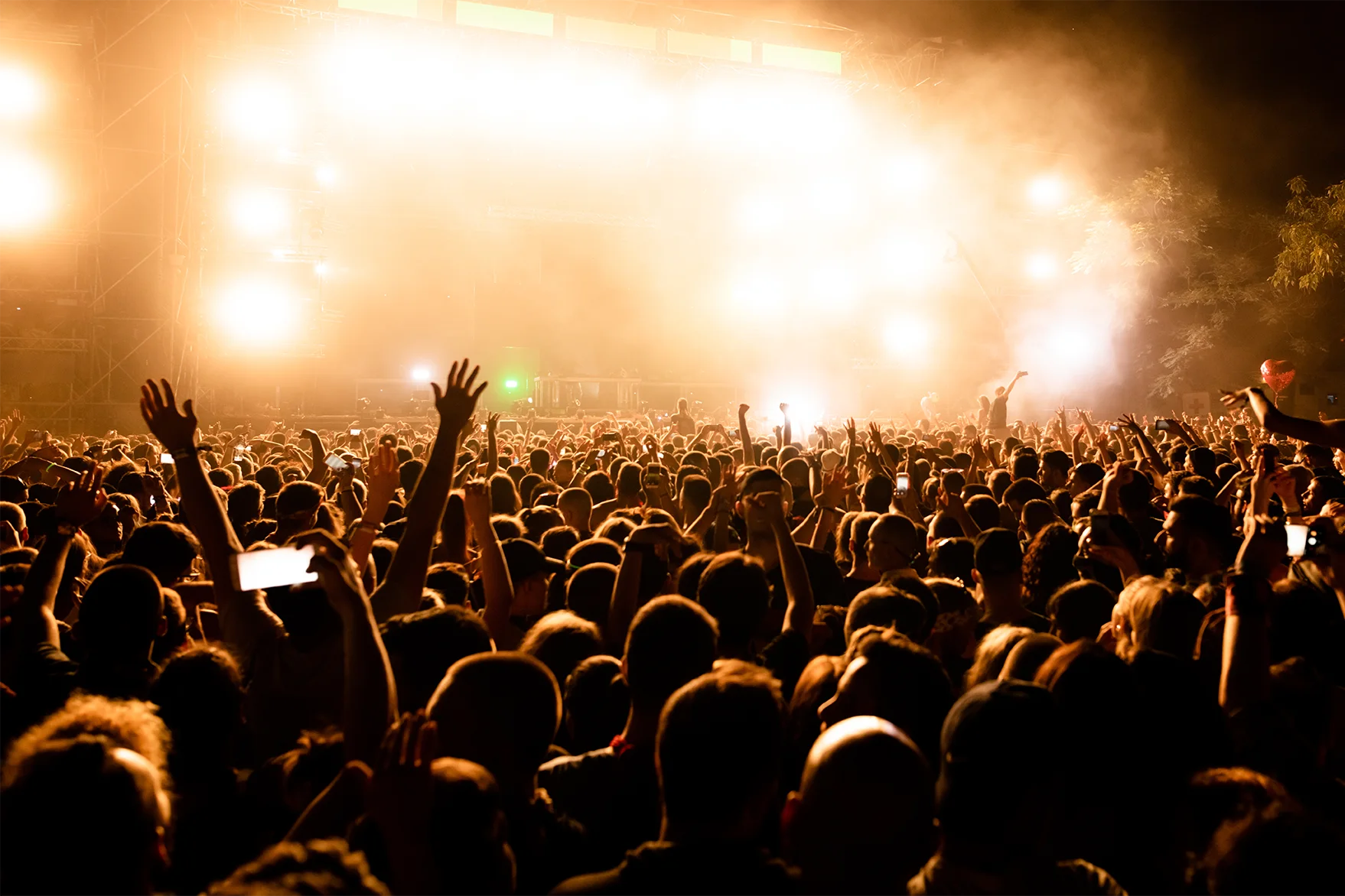 rear-view-large-group-music-fans-front-stage-music-concert-by-night-copy-space